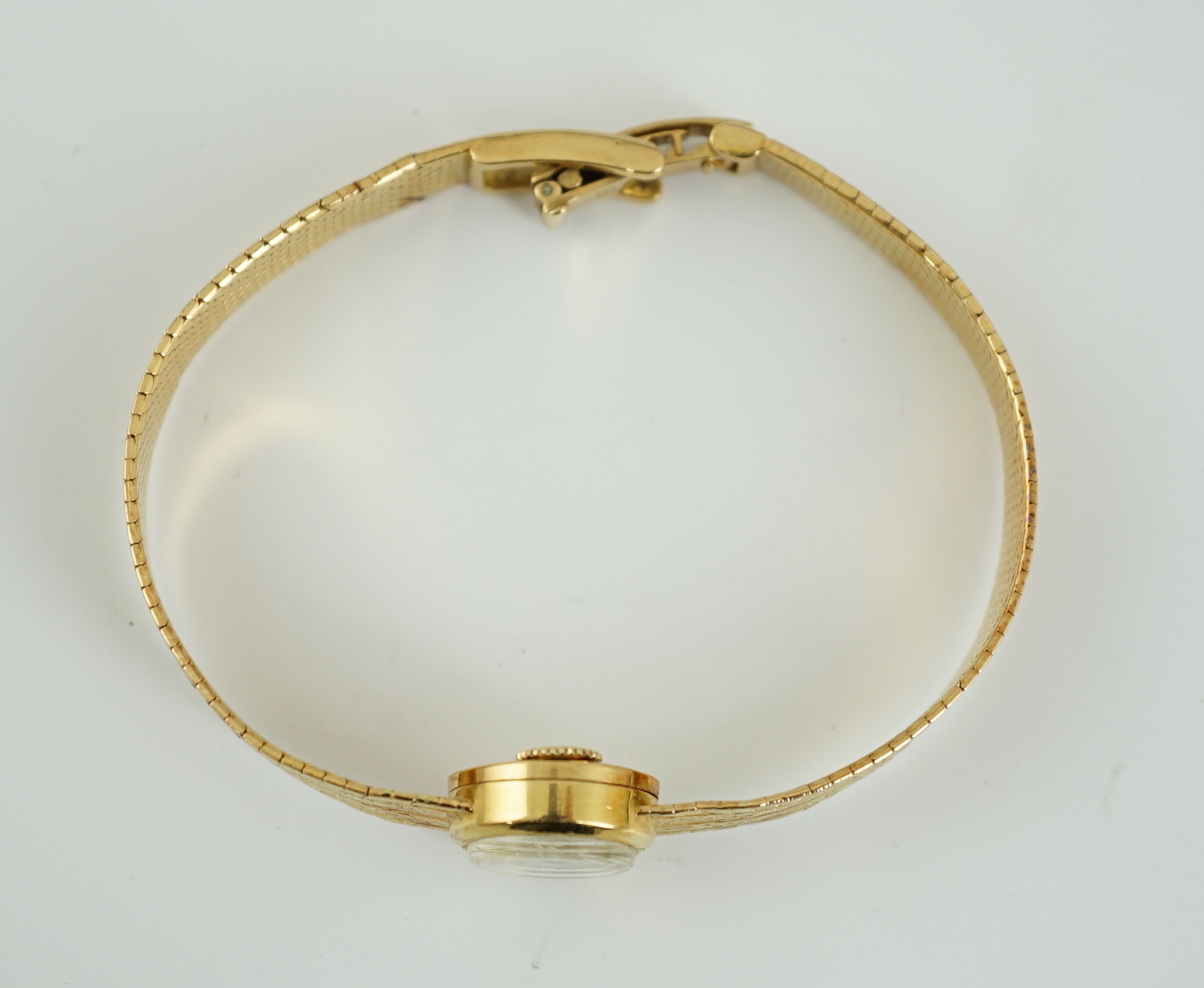A lady's 18ct gold Jaeger LeCoultre manual wind wrist watch